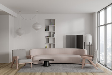 Front view on bright living room interior with sofa, armchair