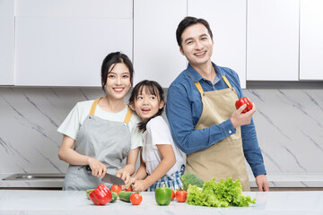 Image of Asian family in the kitchen