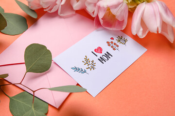 Composition with greeting card, eucalyptus branch and flowers on color background, closeup. Mother's day celebration