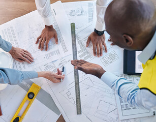 Architect, hands and blueprint in meeting above for construction, team planning or strategy for...