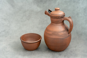 Fototapeta na wymiar Ceramics, a ceramic product made with their own hands on a potter's wheel, a mug.