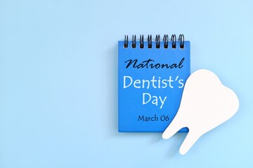 March 6 as National Dentist Day date reminder on blue desk calendar. Celebration concept.