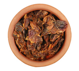 Chicken chips for adult dogs, without added sugar, pet food in clay pot isolated on white, top view