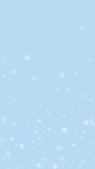 Falling snowflakes christmas background. Subtle flying snow flakes and stars on light blue winter backdrop. Beautifully falling snowflakes overlay. Vertical vector illustration.