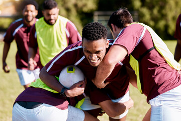 Team, tackle or rugby men in training, exercise or workout match on sports field running with a ball. Challenge, strong man or powerful group in tough competitive game with physical fitness or effort