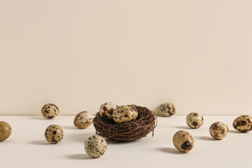 Nest with Easter eggs on white table