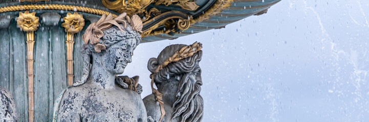 Statues of the Fountain of the Seas on the Place de la Concorde square in Paris, France