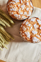 Easter cake with rustic decoration, wheat on wooden table the holiday, Happy Easter Holiday.