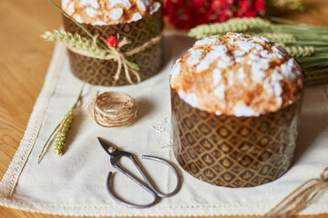 Easter cake with rustic decoration, wheat on wooden table the holiday, Happy Easter Holiday.