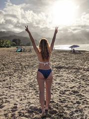 Woman on Hanalei Bay beach
