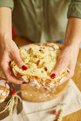 Happy Easter, Woman cut Easter cake for the holiday. The concept of preparing for the Easter holiday.
