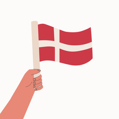 Denmark flag. National flag of the country in hand. Vector cartoon illustration.