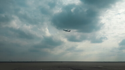 Airplane taking off
Pudong International Airport in Shanghai, China and an airplane taking off