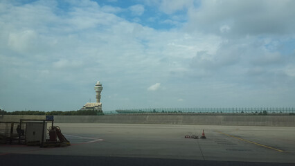 Fototapeta na wymiar Shanghai Pudong Airport Shanghai, China - October 4, 2015 - Pudong International Airport's airport ramp and flight control tower