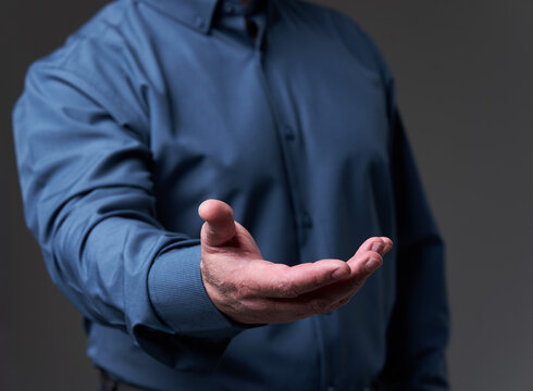 Hand Of A Businessman Offering Or Requesting