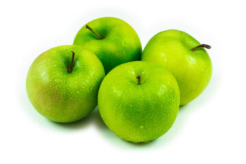Four Juicy Green Apples, whole and isolated on white with dew drops.