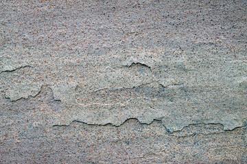 close-up photo of rough wall texture with speckles