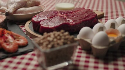 Products with High Protein Content. Chickpeas in bowl with protein food on the table. 