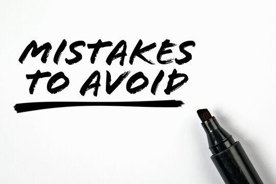 Mistakes To Avoid. Text and black marker on a white background - Powered by Adobe