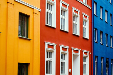 Fototapeta na wymiar Germany street, facades, bright juicy colors. Red, blue, yellow.