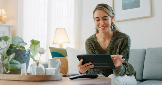 Woman, digital tablet and living room app, typing and reading ebook, online shopping and 5g multimedia technology on sofa home lounge. Relax girl on social media, internet website and wifi connection