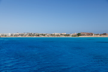 Obraz premium Hurghada, Egypt. . Buildings, swimming pools and a recreation area by the red sea.