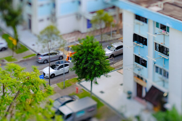 Tilt-shift lens photography; miniature effect – Aerial view of HDB heartland estate neighbourhood...