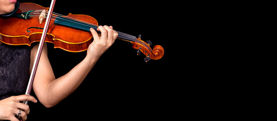 Violin player. Violinist hands playing violin orchestra musical instrument closeup copyspace