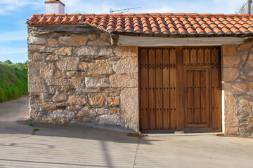 old stone house with wooden door
