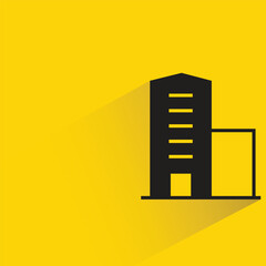 office building with shadow on yellow background