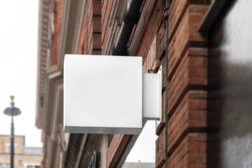 Blank square sign mockup in the urban environment, empty space to display your advertising or branding campaign