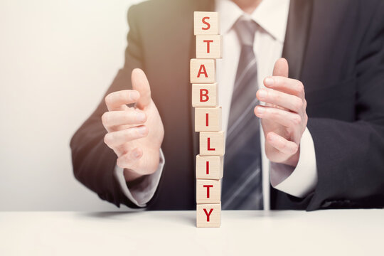 Wooden bricks, business financial stability concept