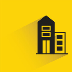 apartment building with shadow on yellow background
