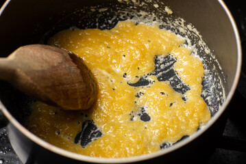 cooking sauce from butter and flour. Add flour to melted butter. Breading.