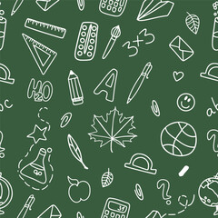 Seamless pattern of school supplies on a green background. Back to school. Vector doodle illustration