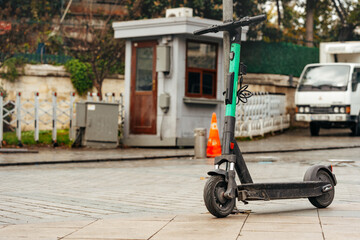 Modern electric scooter parked on the street