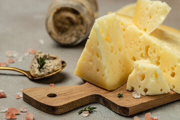 cheese with holes and truffle paste. Food recipe background. Close up