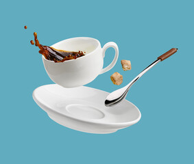 Flying Coffee cup isolated on a blue background