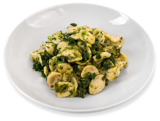Orecchiette pasta with turnip tops, typical Italian recipe from Puglia region in white plate , cut out
