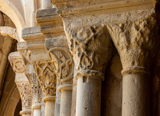 Close-up of several capitals in the beautiful cloister of the Poblet Monastery. Tarragona, Spain