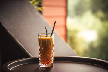 Orange cocktail at the table in the spa hotel