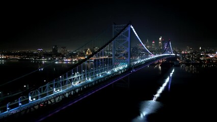 Benjamin Franklin Bridge and Skyline of Philadelphia at night - aerial view - drone photography - Powered by Adobe