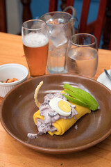 Causa de pulpo octopus Sea food ceviche Assorted food plates Peru traditional comfort food buffet table