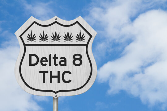 Delta 8 THC message with cannabis leaves on a sign