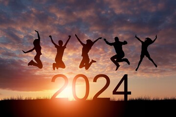 Happy people group jump with 2023 numbers.