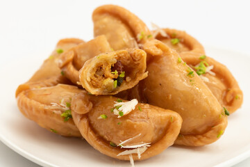 Gujia Also Called Gujiya, Pirukiya, Pirukia, Pedakiya, Karanji, Basundi Or Gughra Stuffed With Mawa, Khoya, Chasni, Mava, Khoa - Indian Sweet Dumpling Enjoyed On Deepawali, Teez, Holi, Diwali And Teej