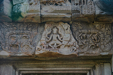 Ancient sandstone carvings in Prasat Hin Phimai Ancient Khmer castle Located in the historical park, Phimai District, Nakhon Ratchasima Province, Thailand.