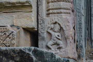 Ancient sandstone carvings in Prasat Hin Phimai Ancient Khmer castle Located in the historical...