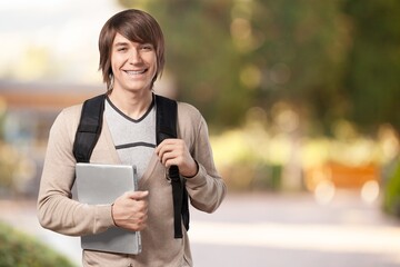 University young happy student posing in campus