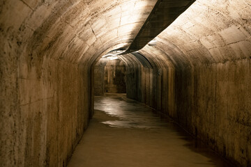 Fototapeta na wymiar Dark tunnel of underground military shelter Zerostrasse in Pula Croatia 